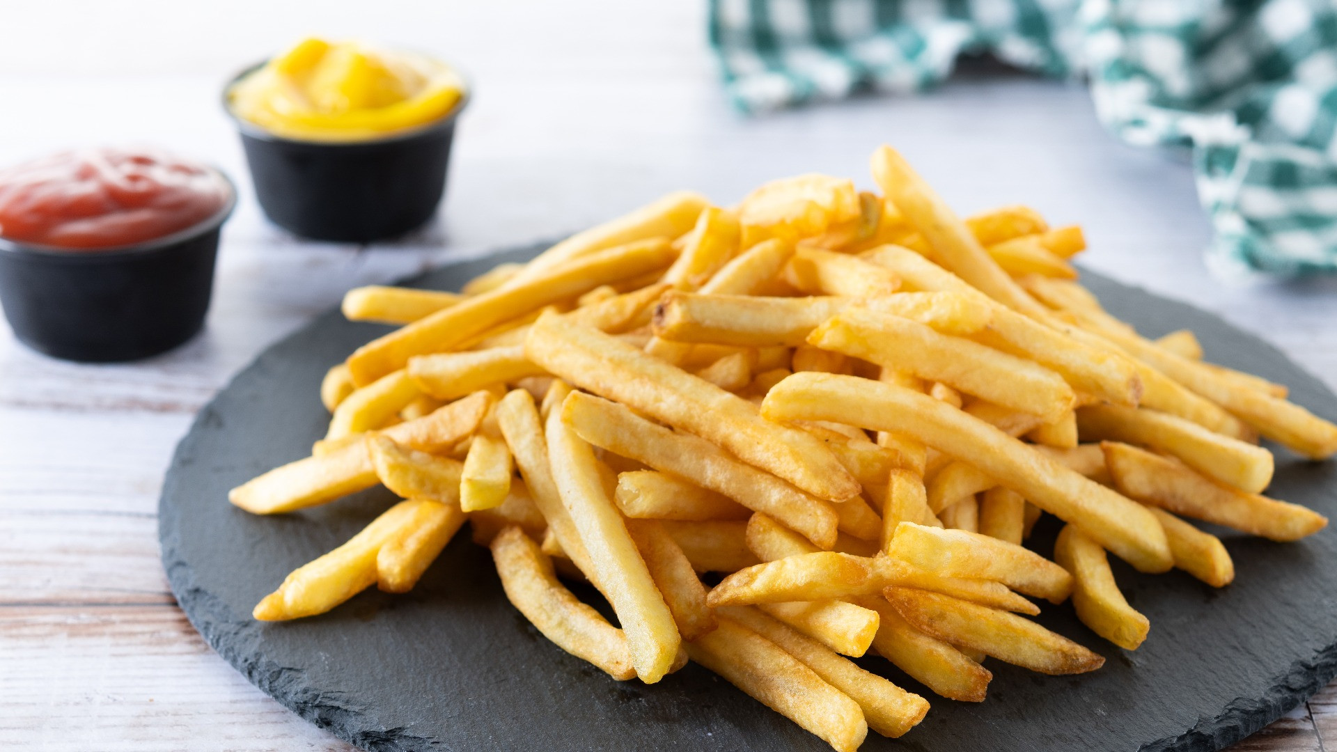 fried-potatoes-french-fries-wooden-table